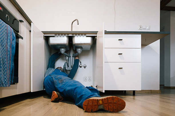 Professional Emergency Plumber technician working in Lincoln, MA